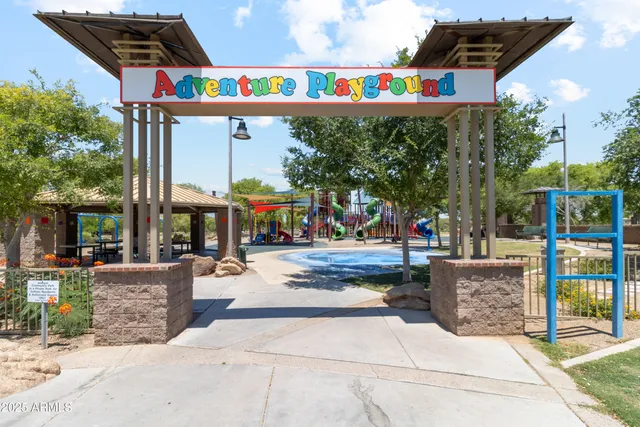 a view of swimming pool with outdoor seating