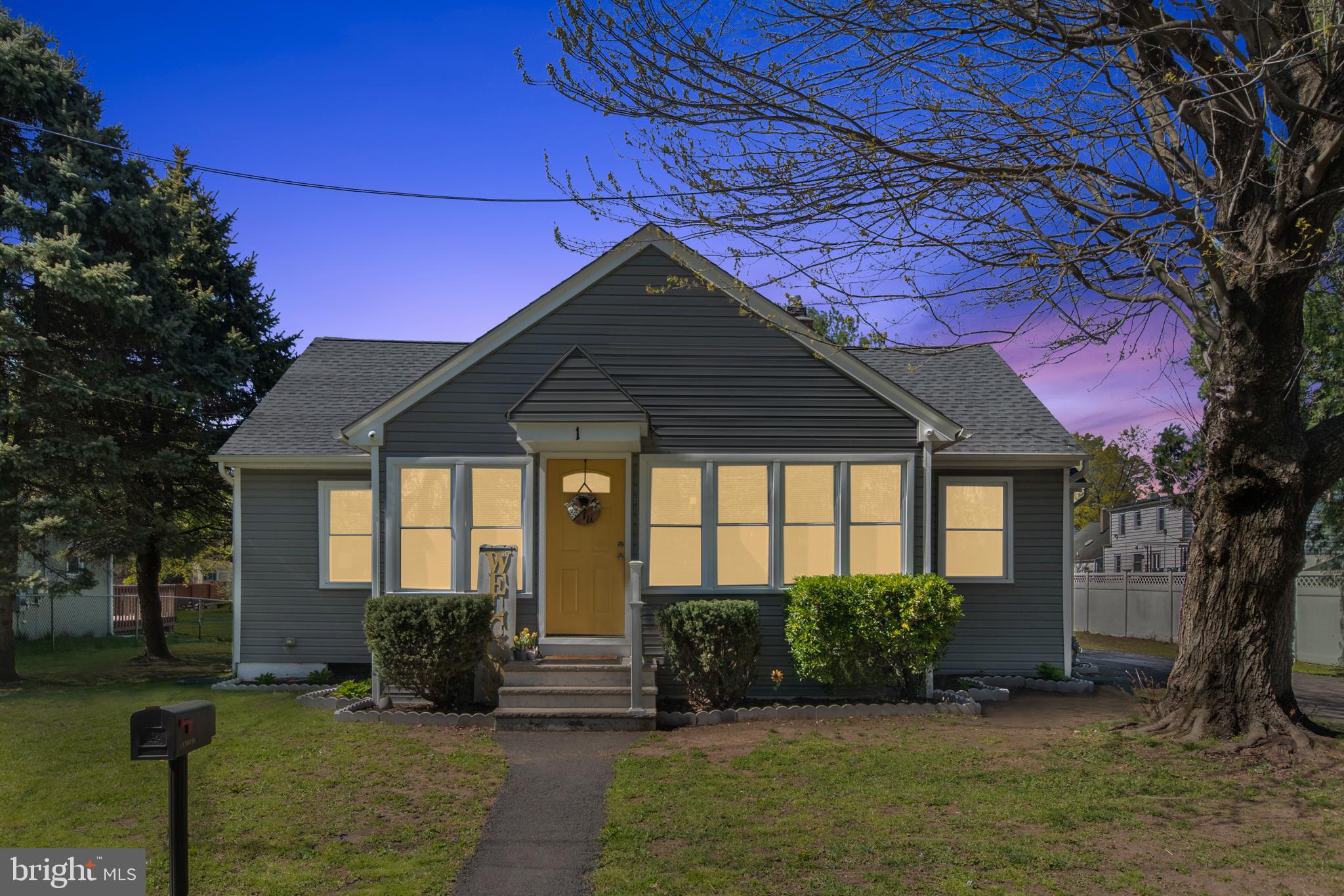 1 West Post Road Morrisville, PA 19067 - Photo 1 of 16 a front view of a house with garden