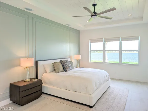 a living room with fireplace furniture and a flat screen tv
