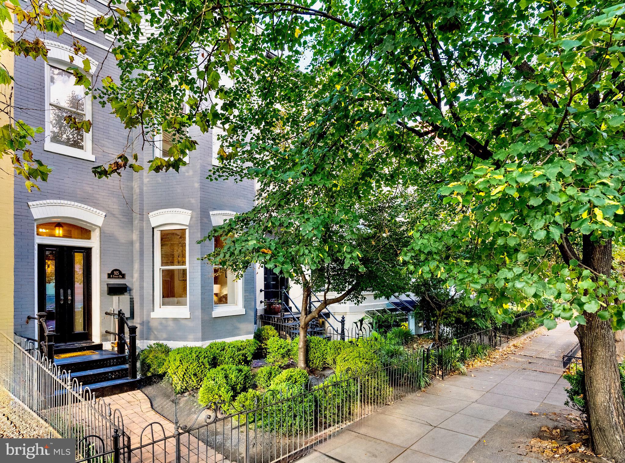 a view of a house with a tree