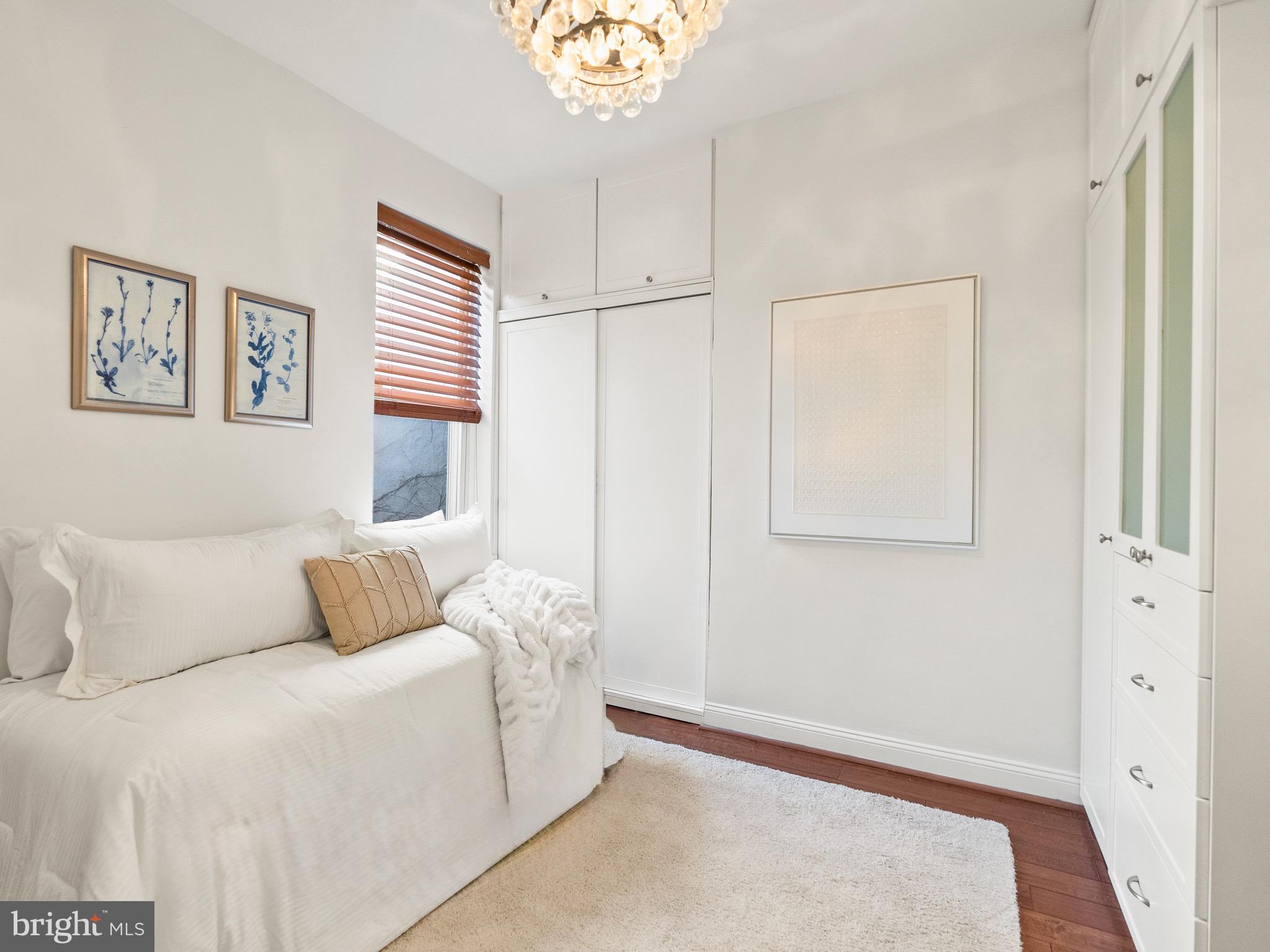925 R Street Northwest Washington, DC 20001 - Photo 18 of 23 a bedroom with a bed and a window