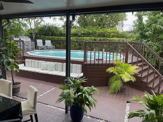 2701 Southwest 79th Avenue Miami, FL 33155 - Photo 20 of 53 a view of a balcony with chairs
