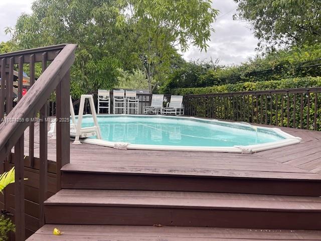 2701 Southwest 79th Avenue Miami, FL 33155 - Photo 23 of 53 a view of swimming pool with a back yard