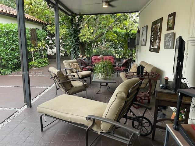 2701 Southwest 79th Avenue Miami, FL 33155 - Photo 27 of 53 a view of a patio with table and chairs and potted plants
