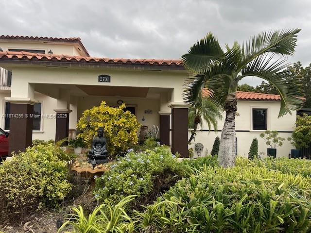 2701 Southwest 79th Avenue Miami, FL 33155 - Photo 3 of 53 a front view of a house with garden
