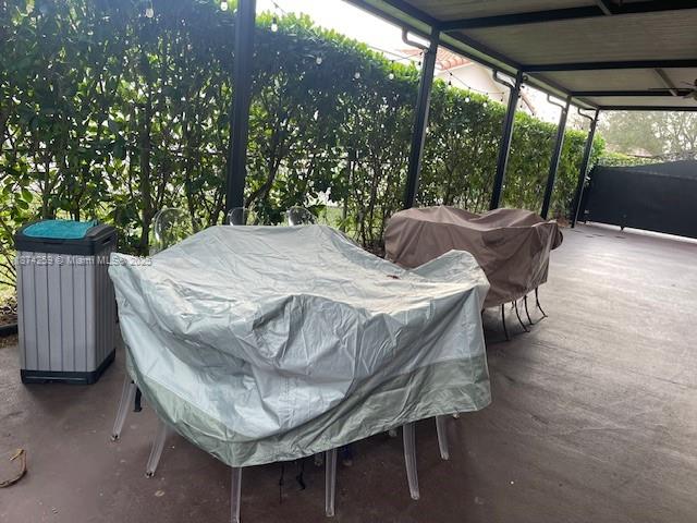 2701 Southwest 79th Avenue Miami, FL 33155 - Photo 32 of 53 a view of backyard with outdoor seating and green space