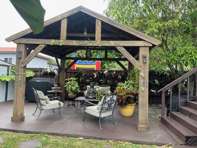 2701 Southwest 79th Avenue Miami, FL 33155 - Photo 34 of 53 a view of a chairs and table in the patio in front of a house