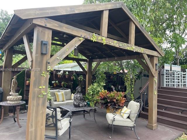 2701 Southwest 79th Avenue Miami, FL 33155 - Photo 35 of 53 a view of a chair and table in backyard of the house