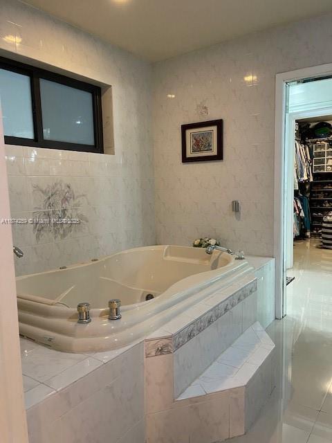 2701 Southwest 79th Avenue Miami, FL 33155 - Photo 38 of 53 a bathroom with a tub sink and mirror
