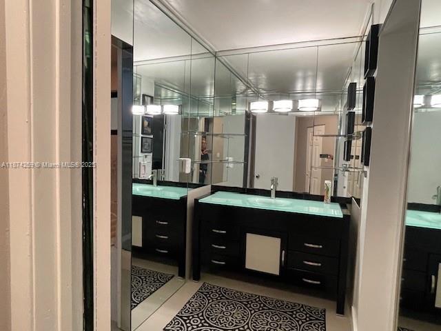 2701 Southwest 79th Avenue Miami, FL 33155 - Photo 42 of 53 a bathroom with a sink vanity and a mirror