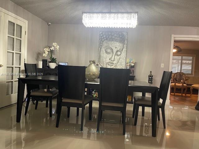 2701 Southwest 79th Avenue Miami, FL 33155 - Photo 6 of 53 a dining room with furniture and chandelier
