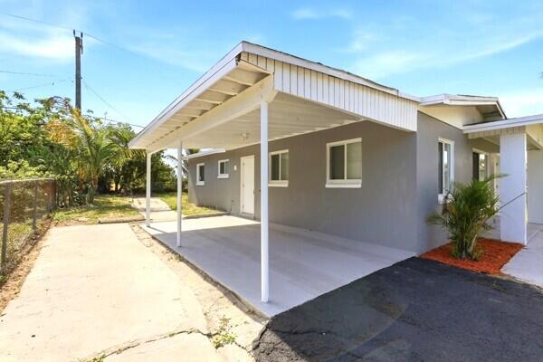 2302 Avenue M Riviera Beach, FL 33404 - Photo 16 of 20 2302 carport