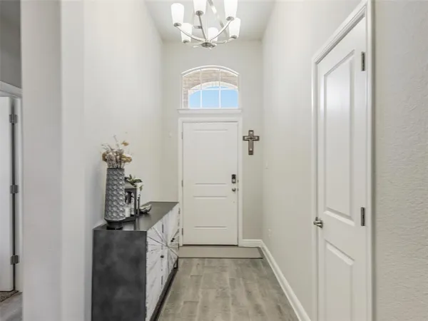 a hallway with windows