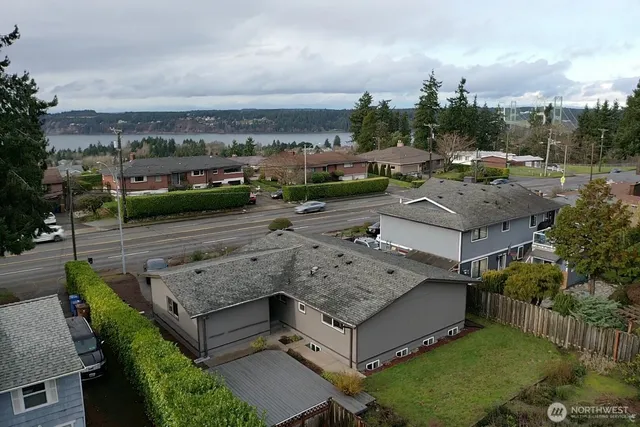 an aerial view of a house with a garden