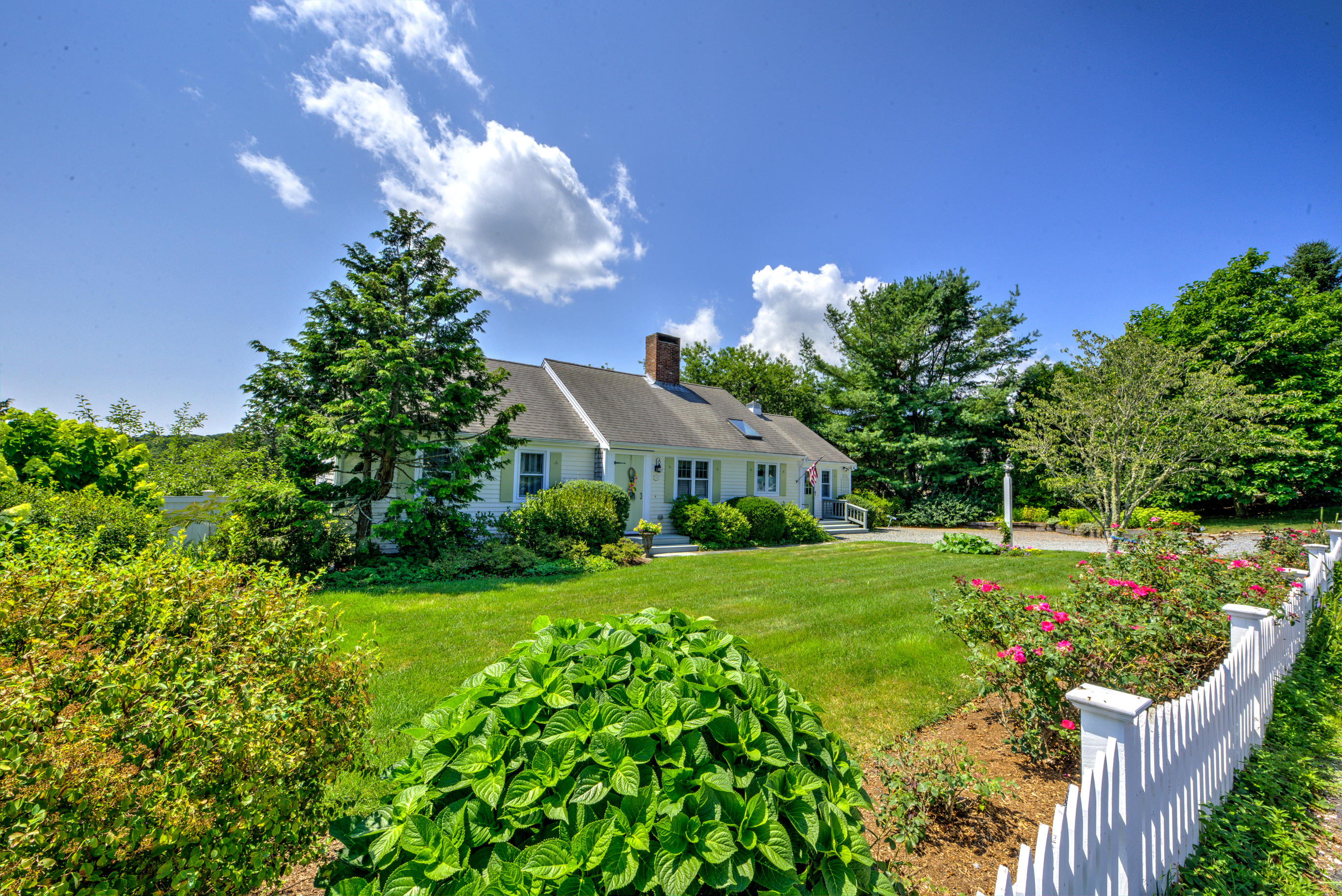 131 Abbey Gate Road Cotuit, MA 02635 - Photo 34 of 34 a front view of a house with garden