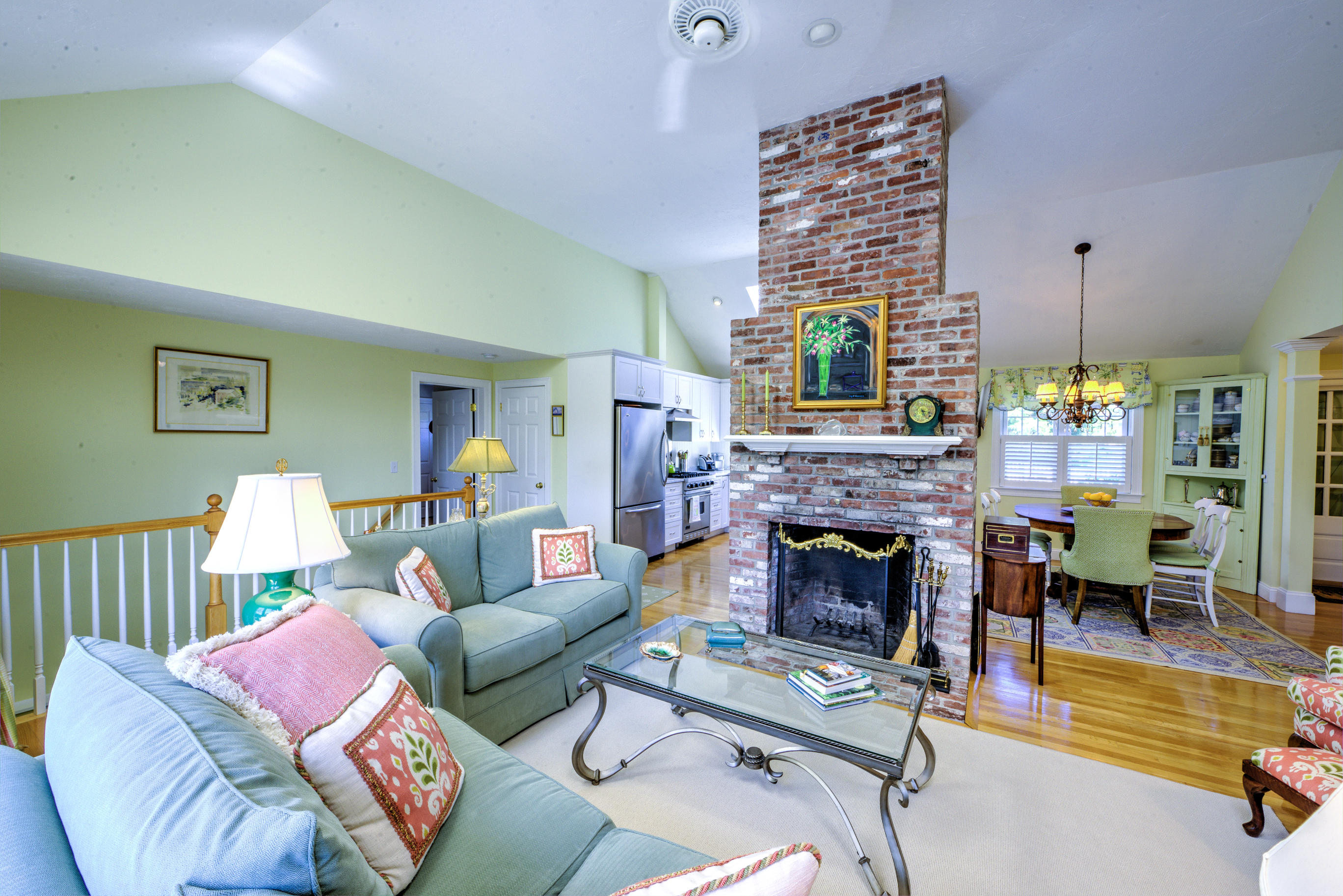 131 Abbey Gate Road Cotuit, MA 02635 - Photo 4 of 34 a living room with furniture fireplace and window