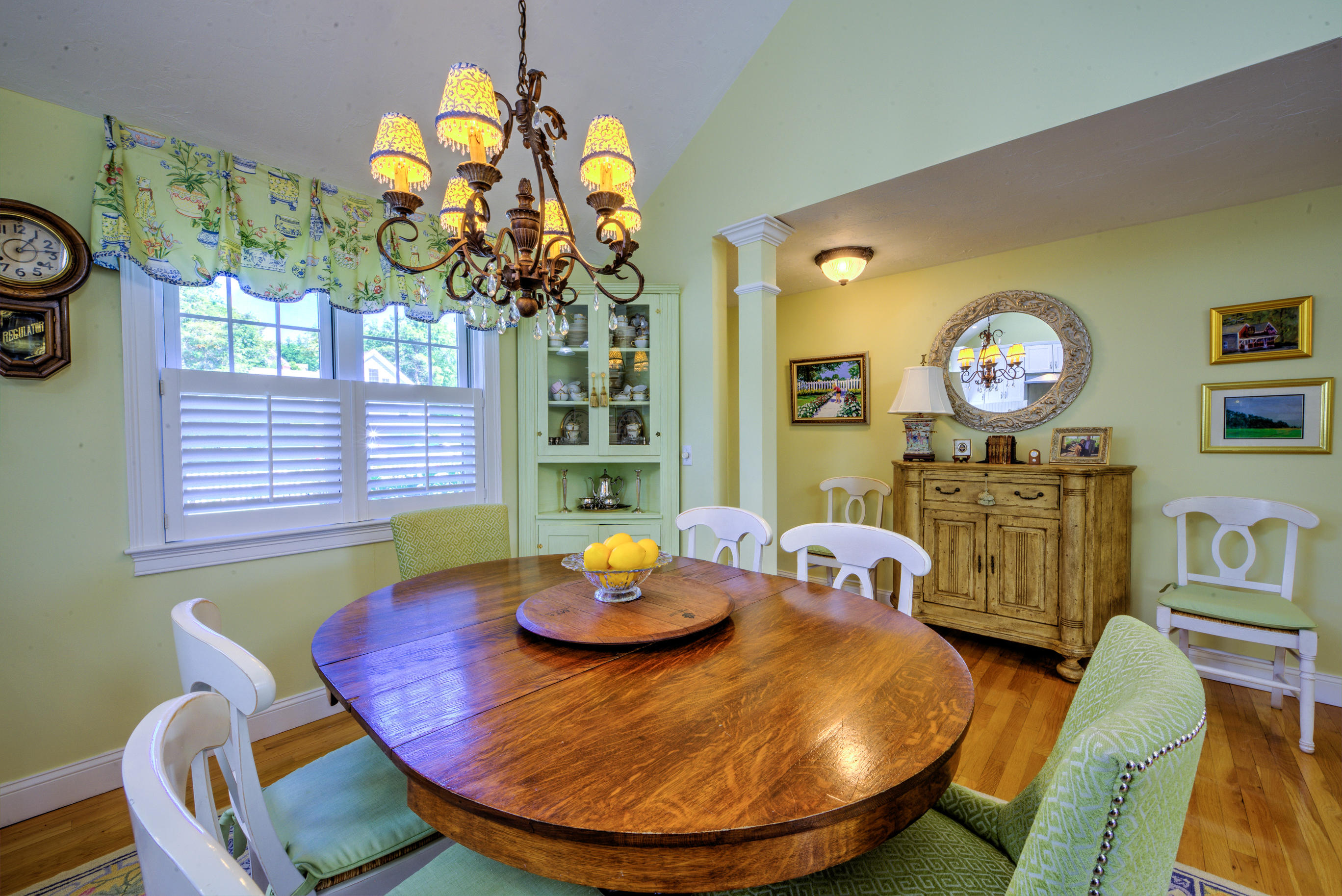 131 Abbey Gate Road Cotuit, MA 02635 - Photo 8 of 34 a dining room filled chandelier and wooden floor