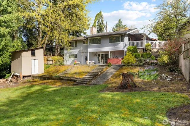 a view of a house with a big yard