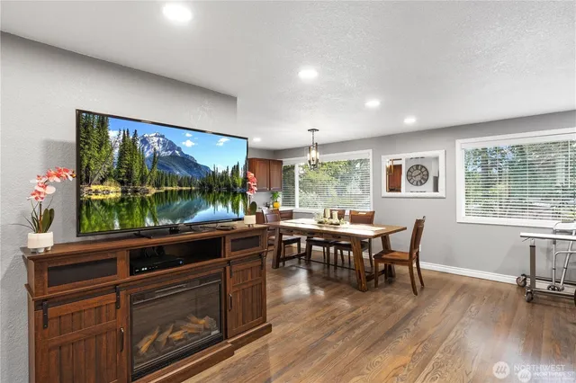 a view of a dining room with furniture window and outside view