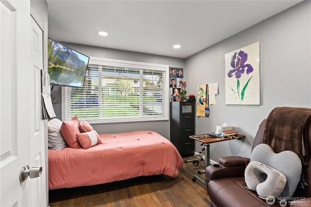 a bed room with bed and a couch