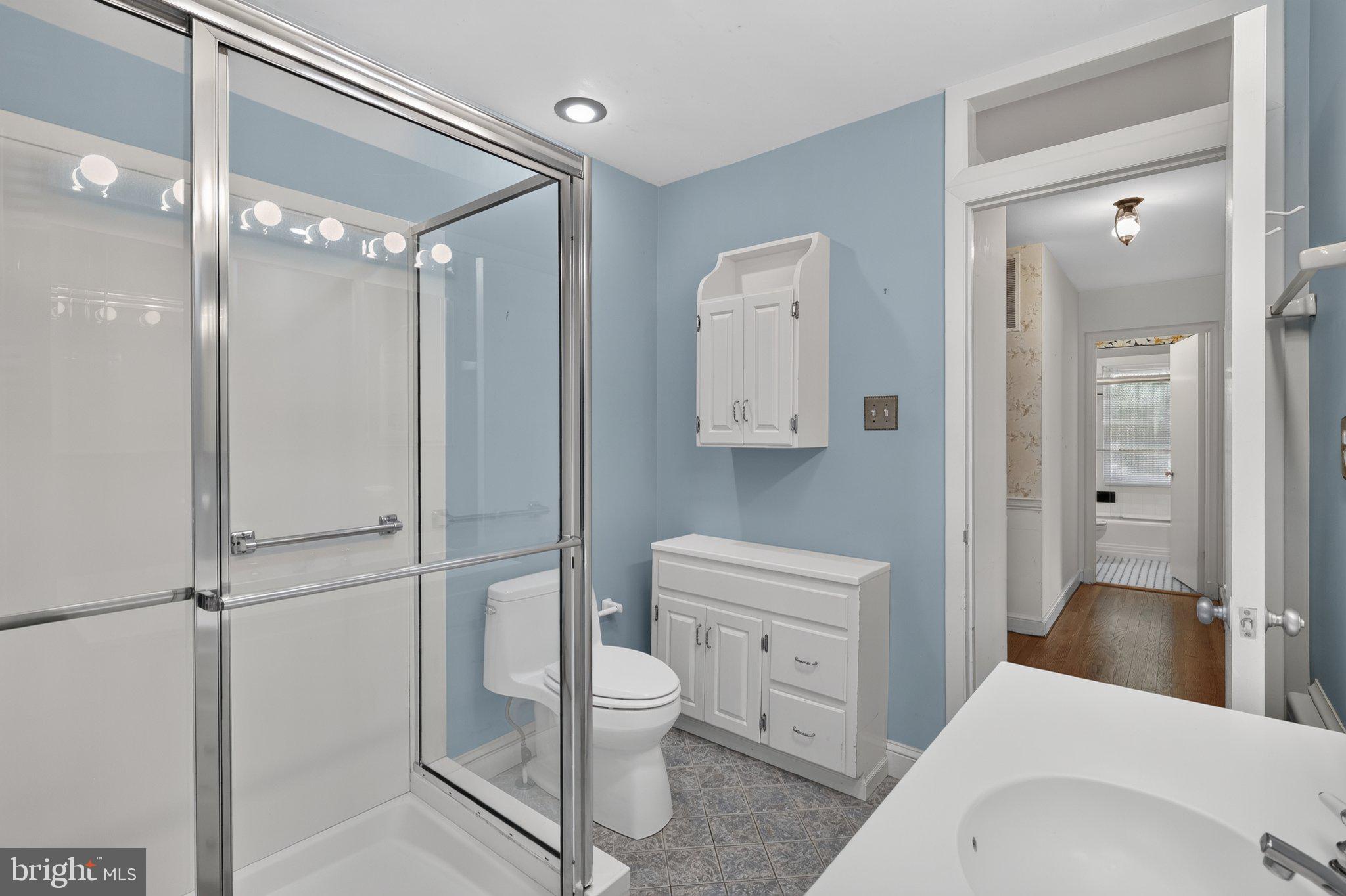 805 Orchard Way Silver Spring, MD 20904 - Photo 12 of 56 Primary bathroom opens to hall