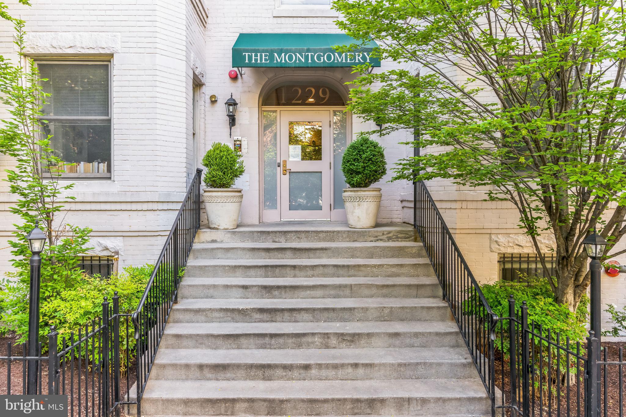 a view of a house with a white door
