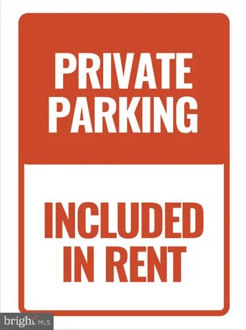 a view of a cars parked in front of a building