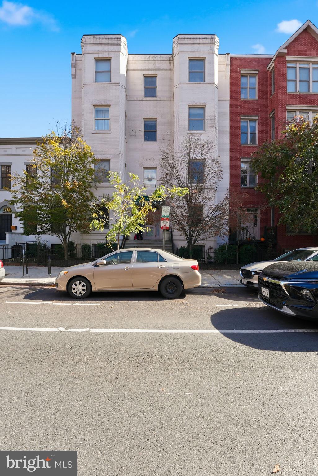 1229 12th Street Northwest, Unit 109 Washington, DC 20005 - Photo 23 of 23 a view of a cars parked in front of a building