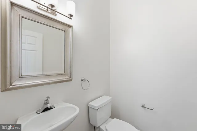 a view of a hallway with washer and dryer
