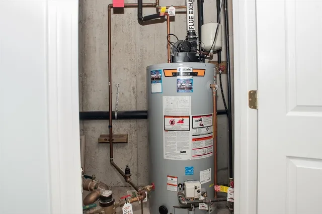 a balcony with wooden benches and a couch