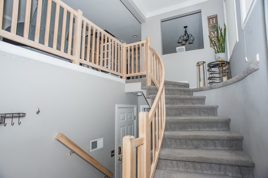 1501 Old Bridge Lane, Unit 1501 Bellingham, MA 02019 - Photo 4 of 42 a view of entryway