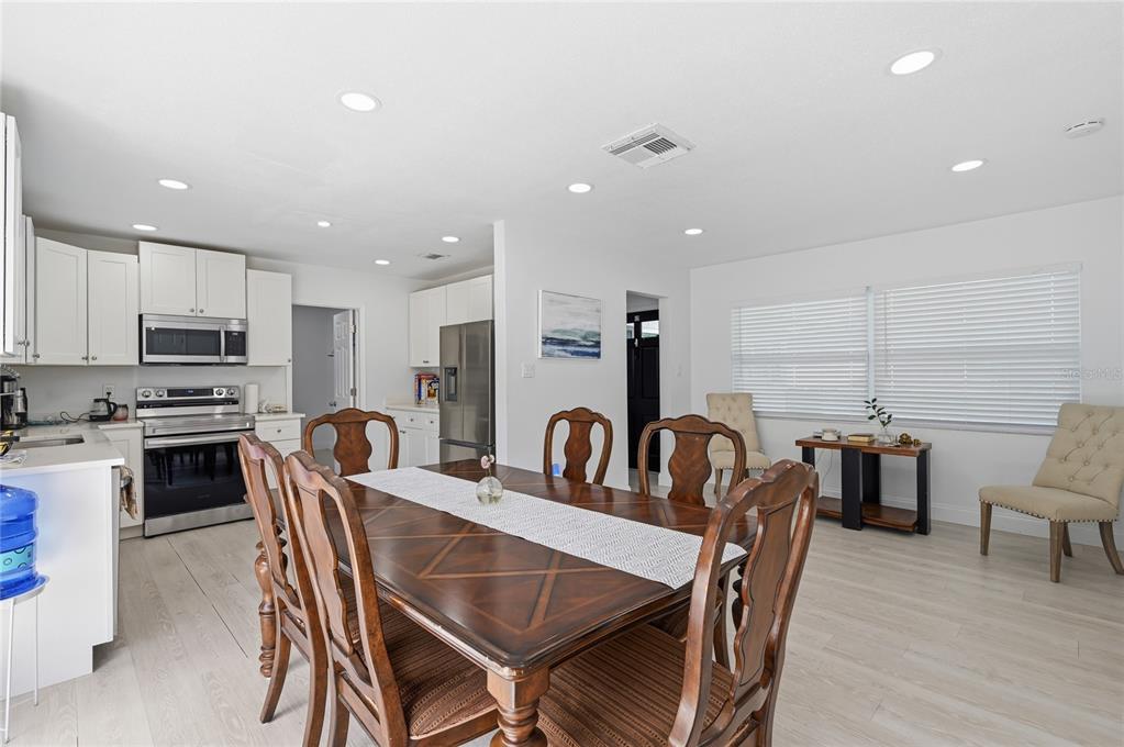 1946 Strathaven Road Winter Park, FL 32792 - Photo 22 of 37 a view of a dining room with furniture