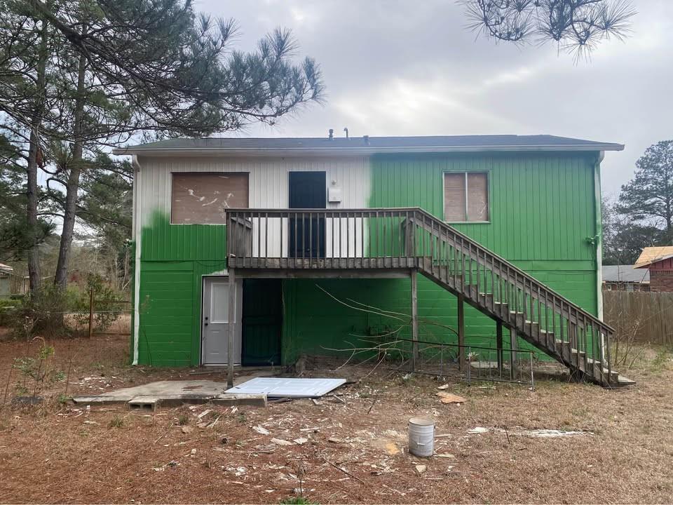 3295 Lancing Lane Macon, GA 31217 - Photo 4 of 15 a view of a house with a yard and a large window