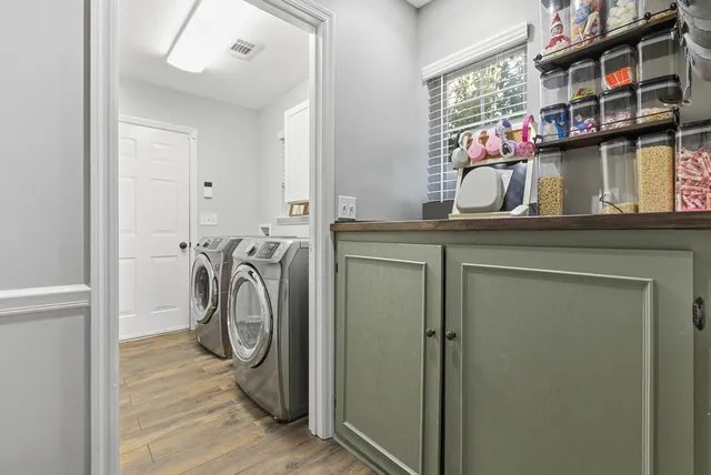 a utility room with dryer and washer