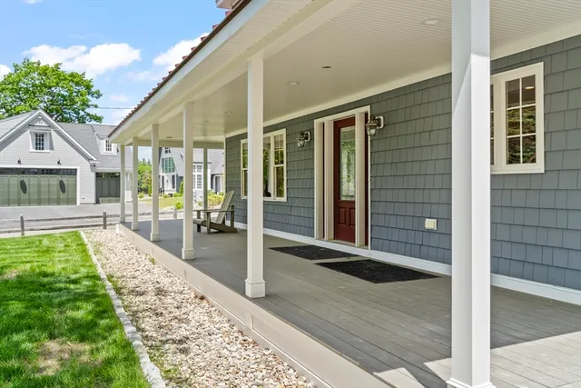 a front view of a house with a porch