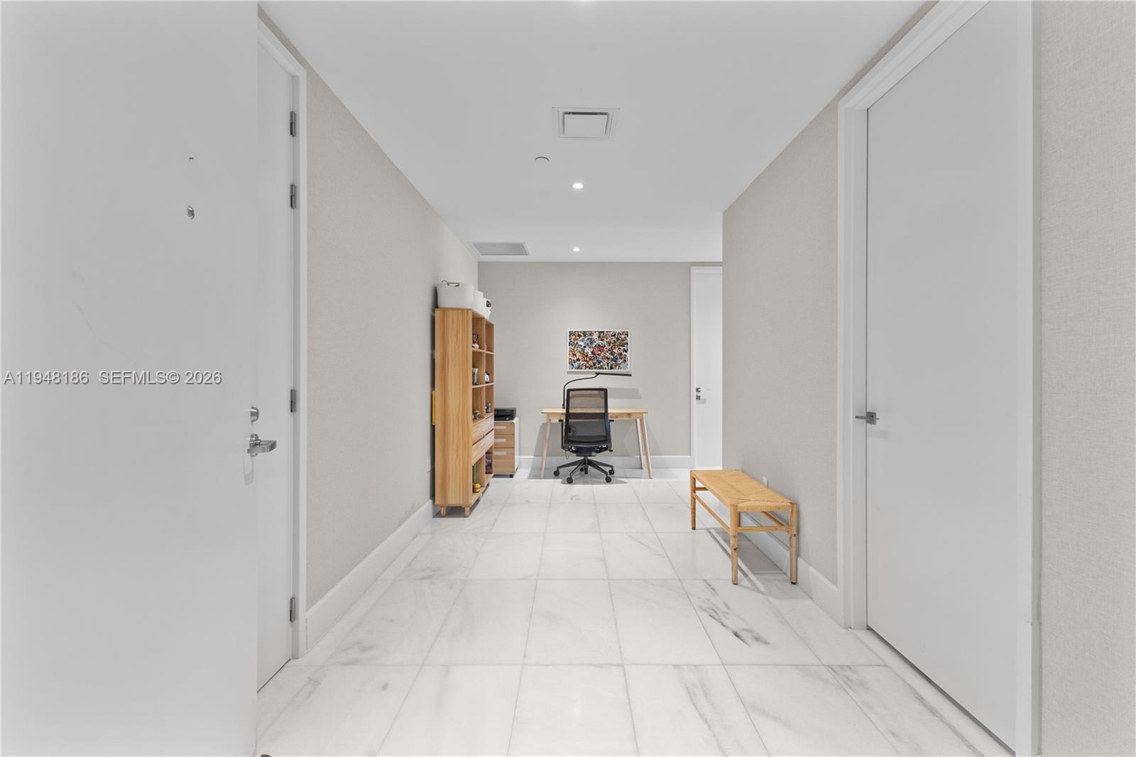 700 Northeast 26th Terrace, Unit 4701 Miami, FL 33137 - Photo 30 of 33 a view of a hallway with a living room