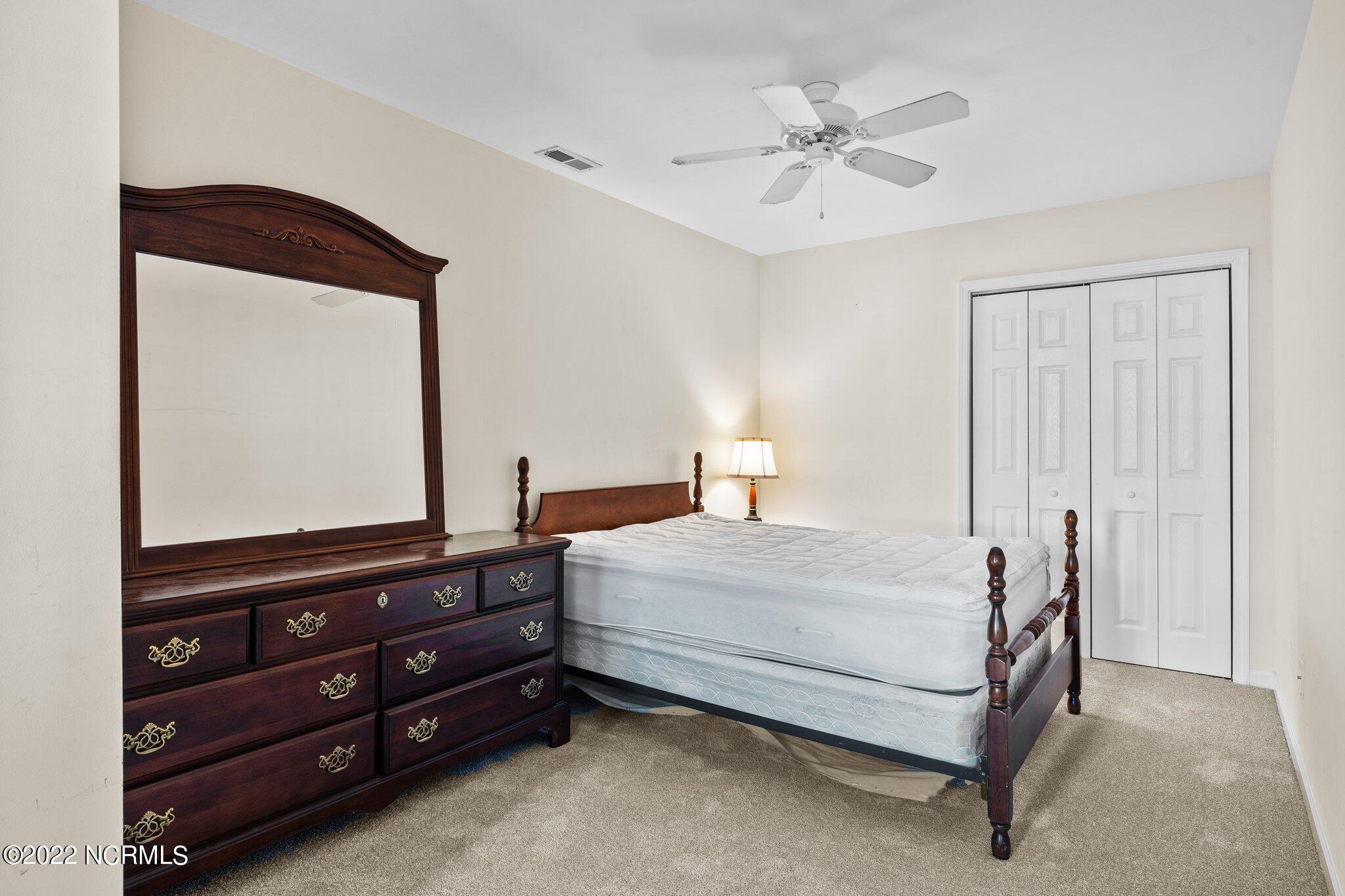 4513 Country Club Road, Unit 104F Morehead City, NC 28557 - Photo 13 of 22 Upstairs Bedroom Two