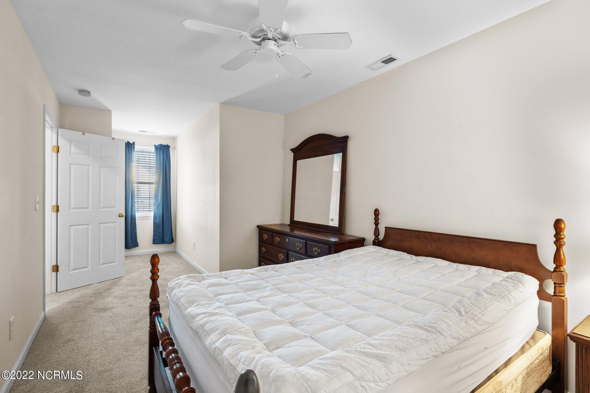 4513 Country Club Road, Unit 104F Morehead City, NC 28557 - Photo 14 of 22 Upstairs Bedroom Two