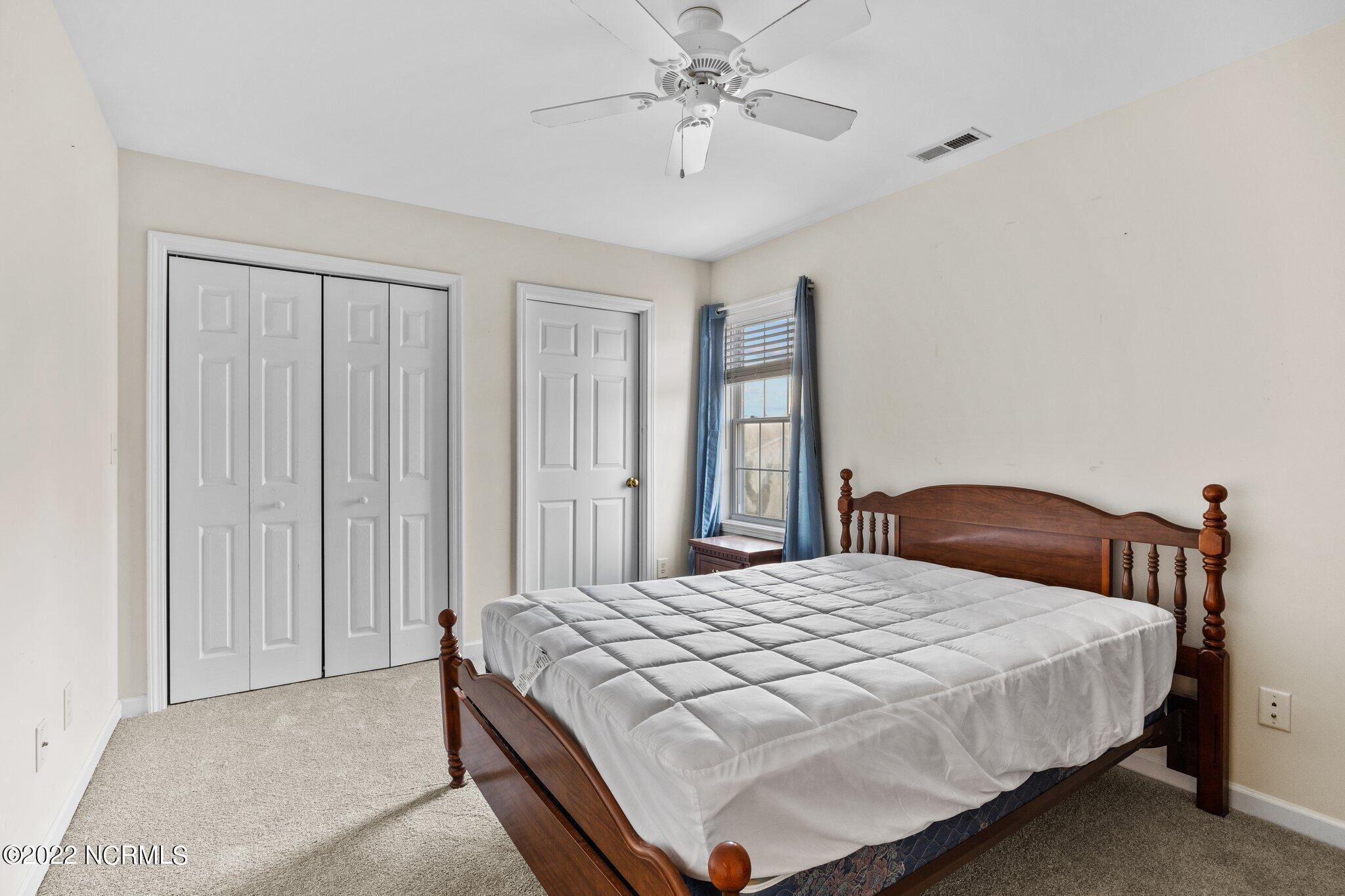 4513 Country Club Road, Unit 104F Morehead City, NC 28557 - Photo 15 of 22 Upstairs Bedroom Three