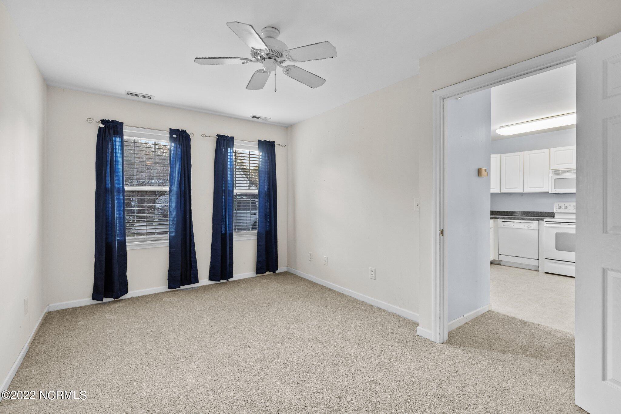 4513 Country Club Road, Unit 104F Morehead City, NC 28557 - Photo 9 of 22 Primary Bedroom