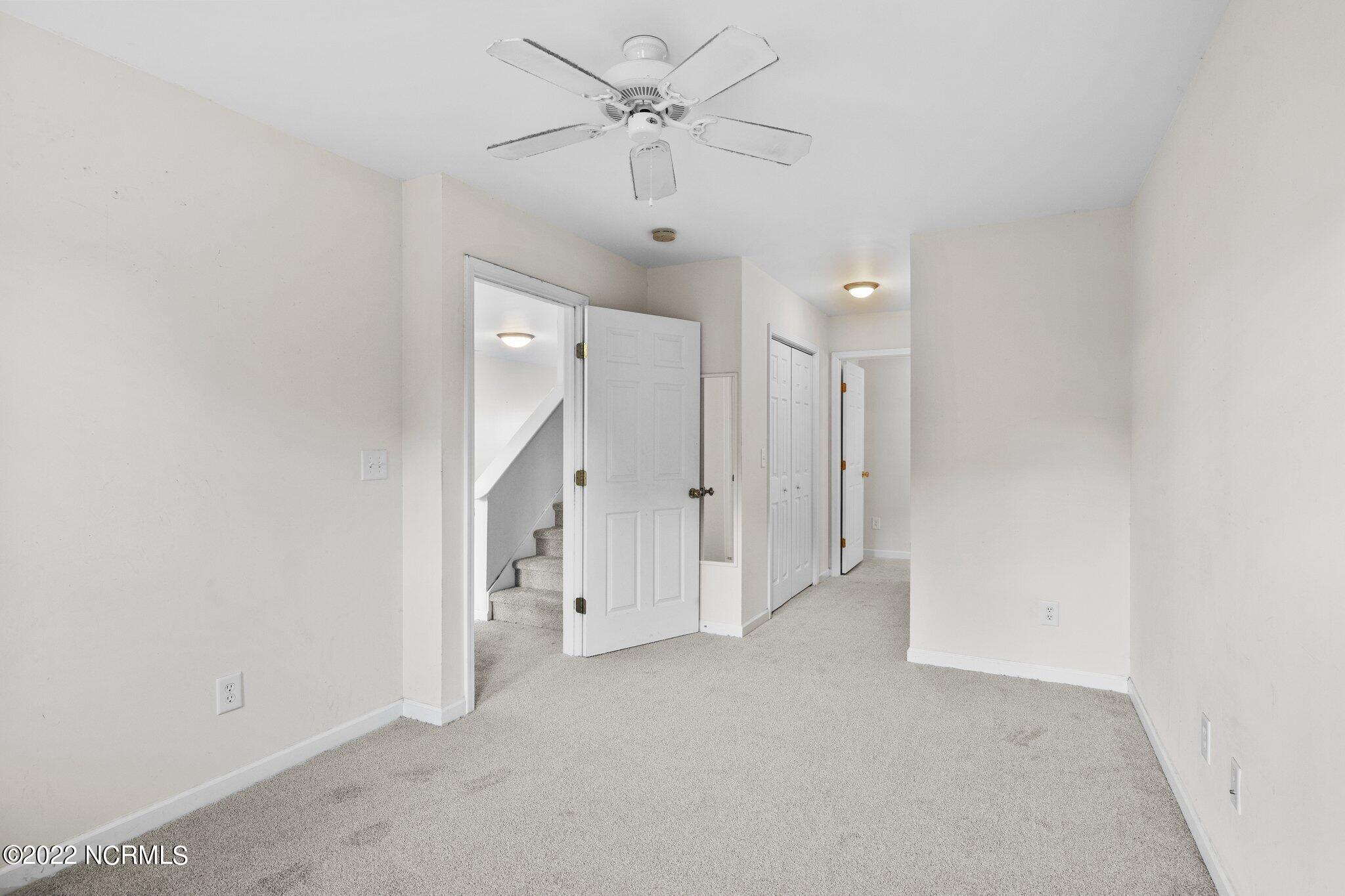 4513 Country Club Road, Unit 104F Morehead City, NC 28557 - Photo 10 of 22 Primary Bedroom