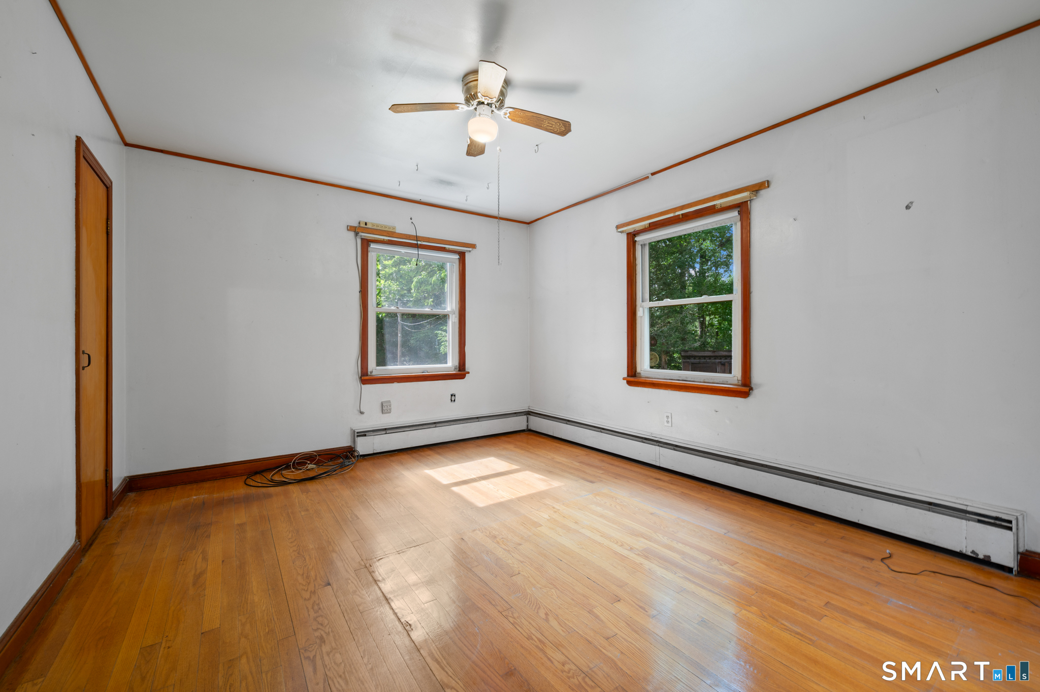 152 Ramstein Road New Hartford, CT 06057 - Photo 8 of 20 a view of an empty room with windows