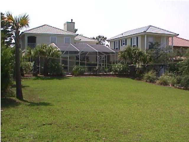 132 Emerald Ridge Santa Rosa Beach, FL 32459 - Photo 5 of 6 a front view of a house with garden