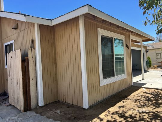 624 South Gordon Street Ridgecrest, CA 93555 - Photo 9 of 26 a view of a house with a backyard