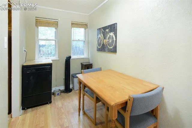 a view of a hallway with a living room