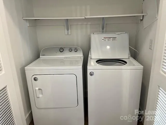 a view of a balcony with a tree