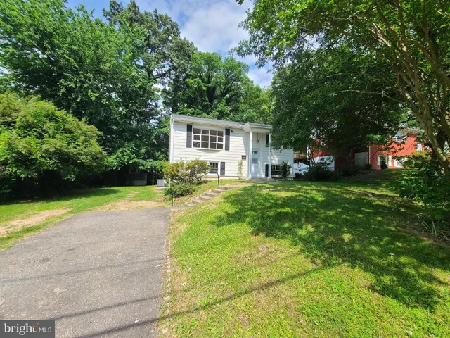 a house view with a garden space