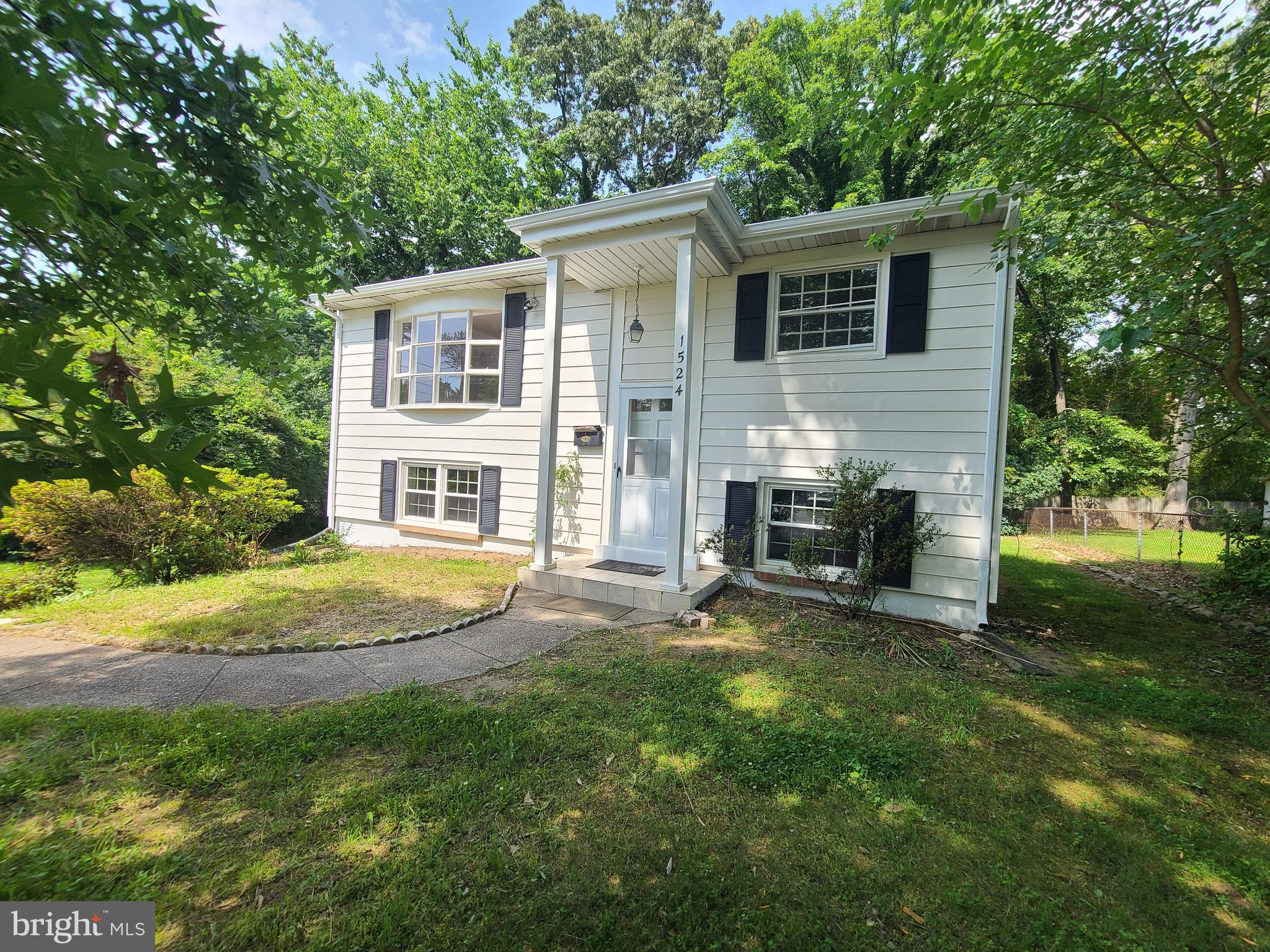 1524 Florida Avenue Woodbridge, VA 22191 - Photo 2 of 36 a view of a house with a yard and sitting area