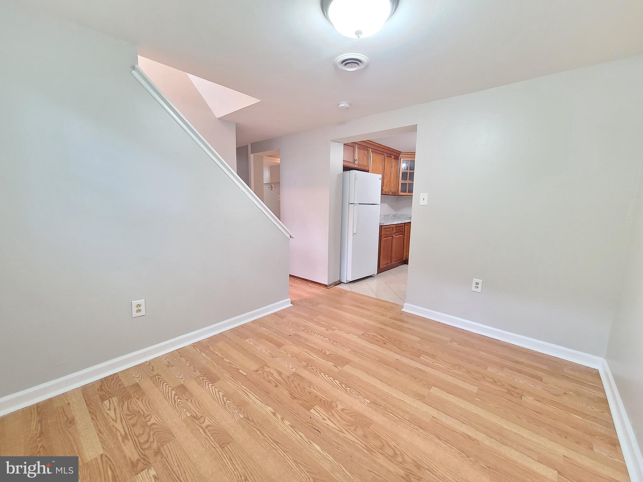 1524 Florida Avenue Woodbridge, VA 22191 - Photo 26 of 36 a view of an empty room with wooden floor