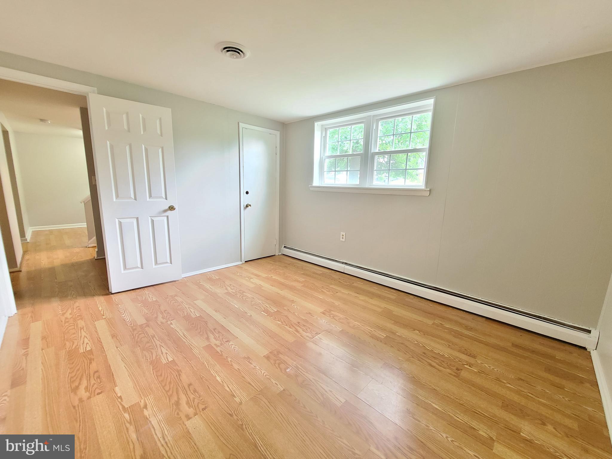 1524 Florida Avenue Woodbridge, VA 22191 - Photo 31 of 36 a view of a room with wooden floor and a window